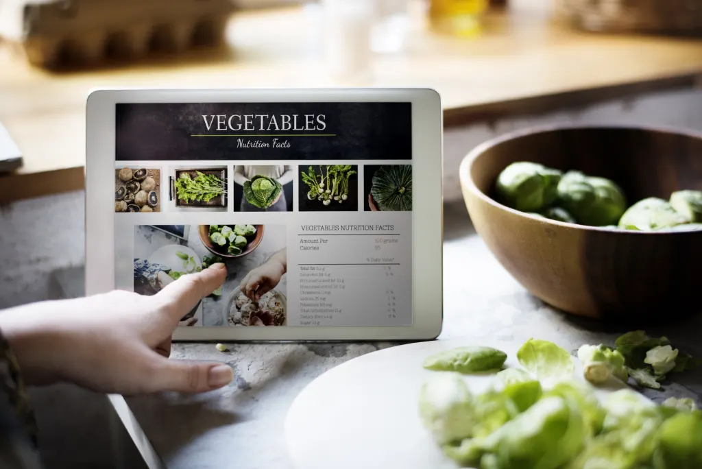 Tabletă care afișează informații nutriționale despre legume